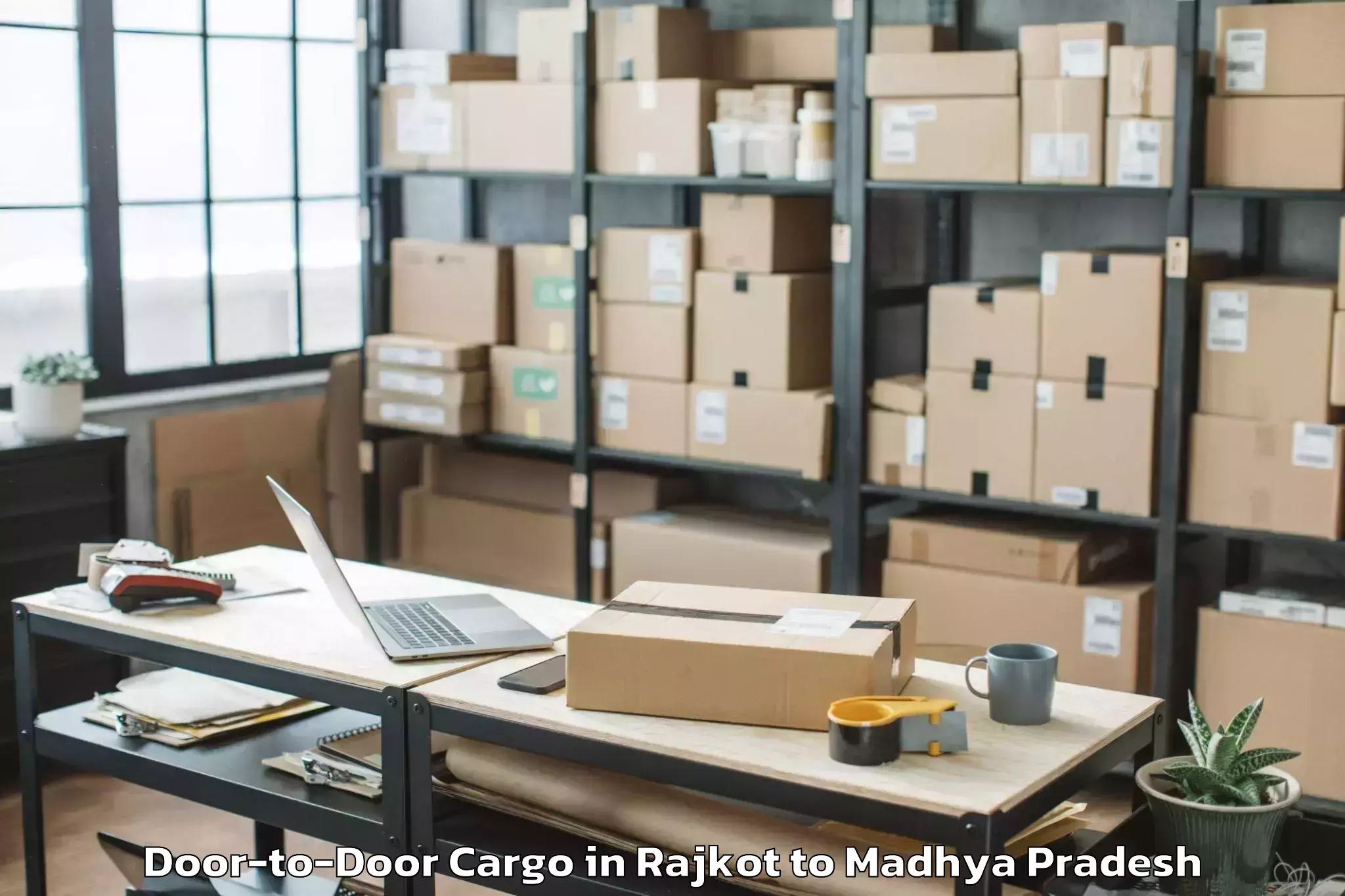 Reliable Rajkot to Bamora Door To Door Cargo